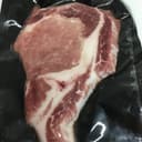 Côte première de porc Cul Noir Limousin IGP surgelée - sous vide par un environ